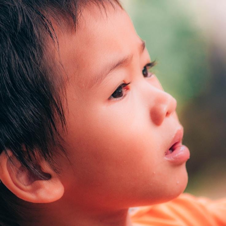 Kaveri Mehta, Lead Design Curator at Studio Forest Signal, reviewing corporate floral arrangements